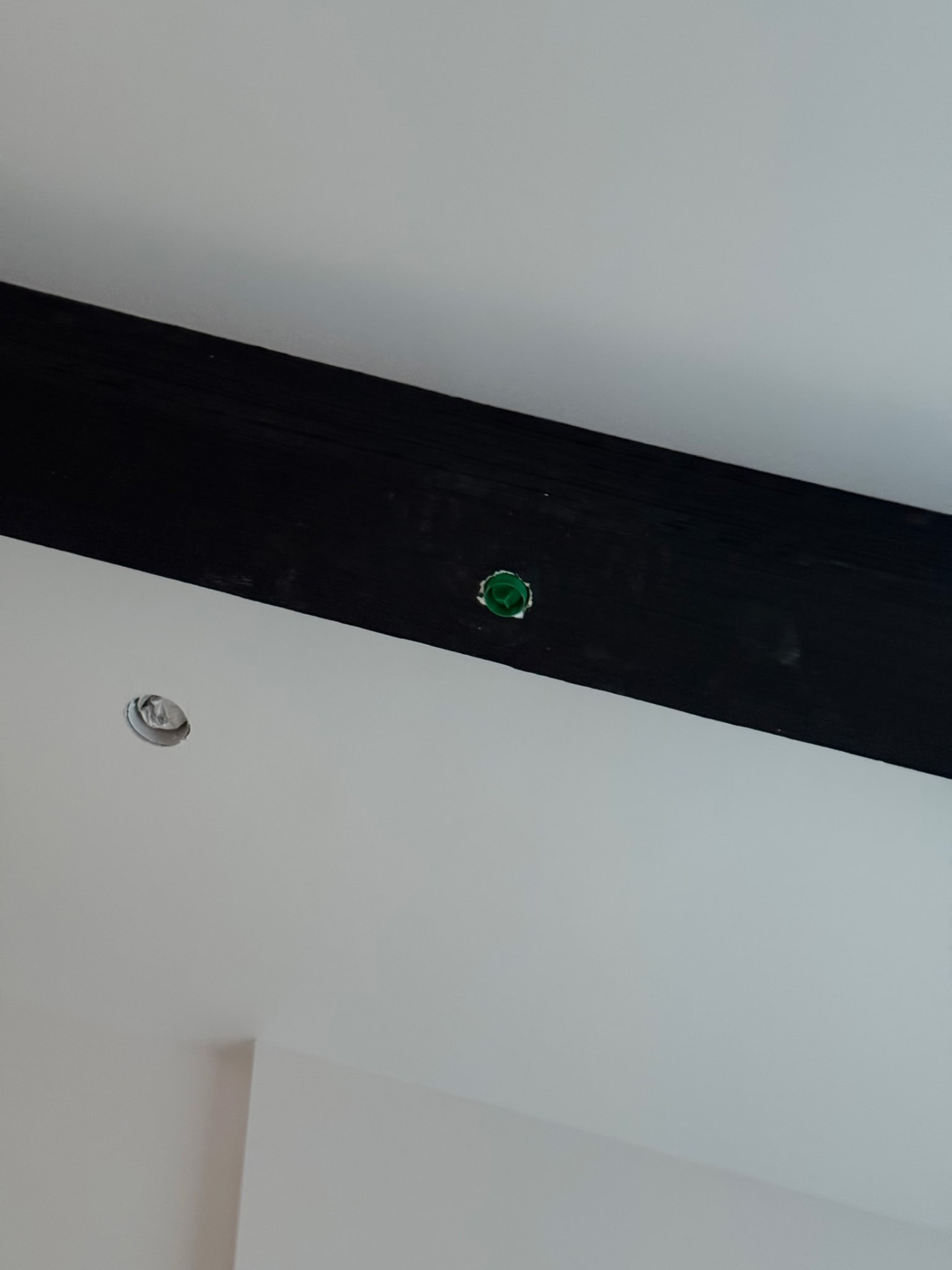 Concealed fire sprinkler head installed in a wood ceiling beam in De Luz, Temecula